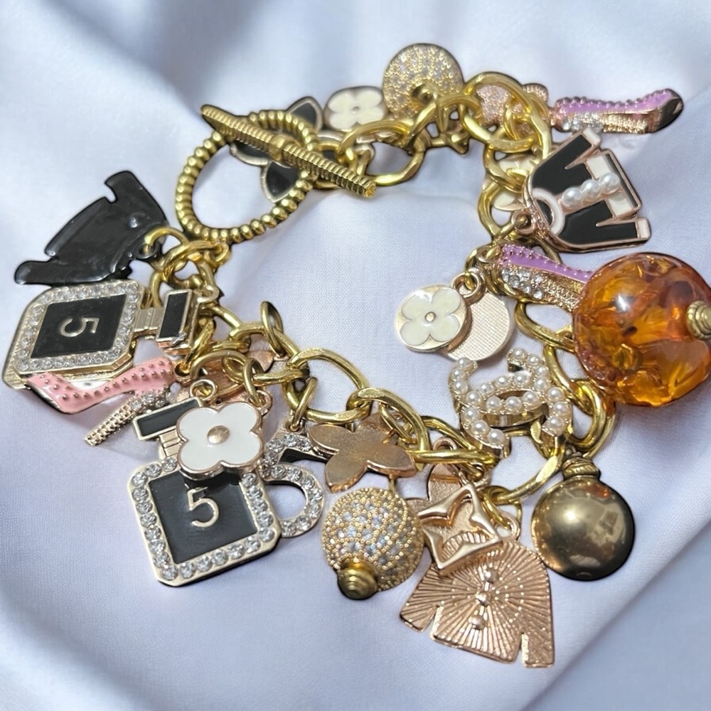 Gold and Black Charm Bracelet - Picture 3 of 11